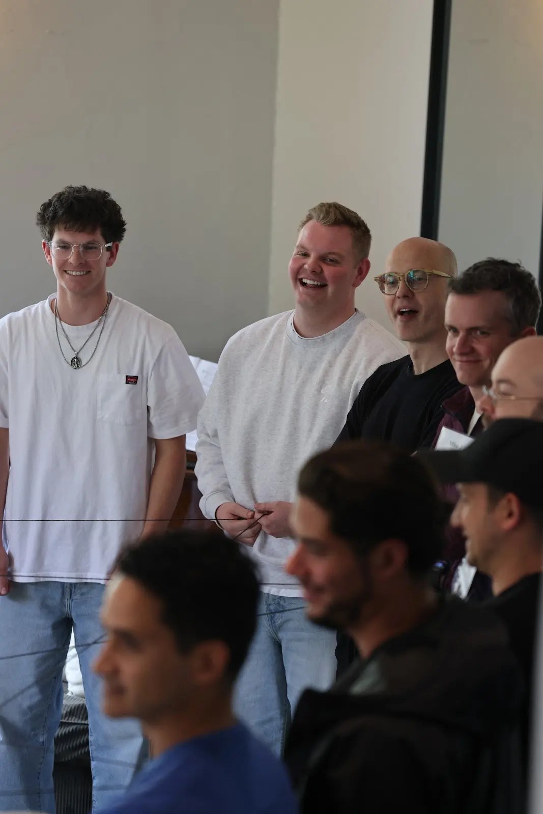 Participants laughing together during a session