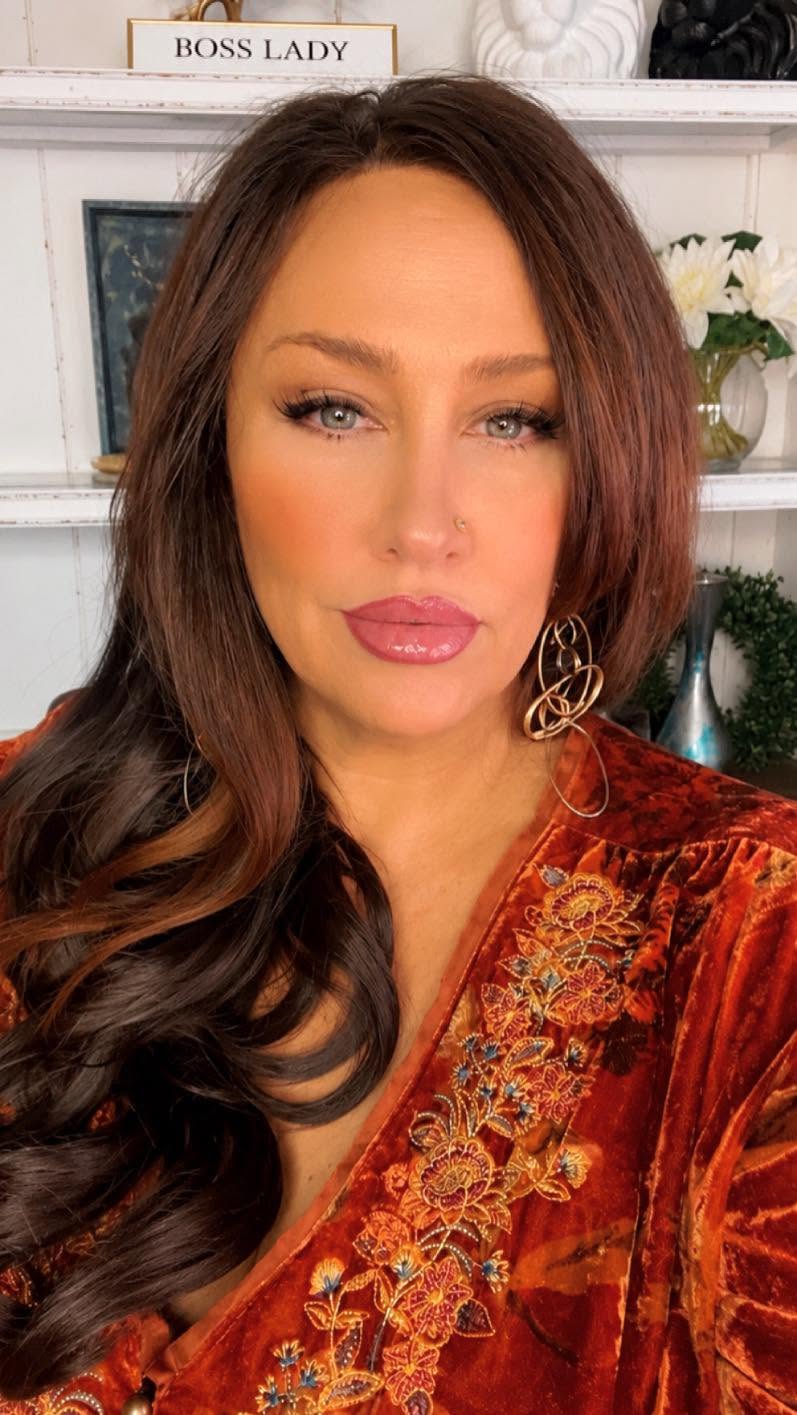 Woman standing at the edge of transformation, questioning long-held beliefs and stepping into personal freedom, truth, and spiritual awakening.