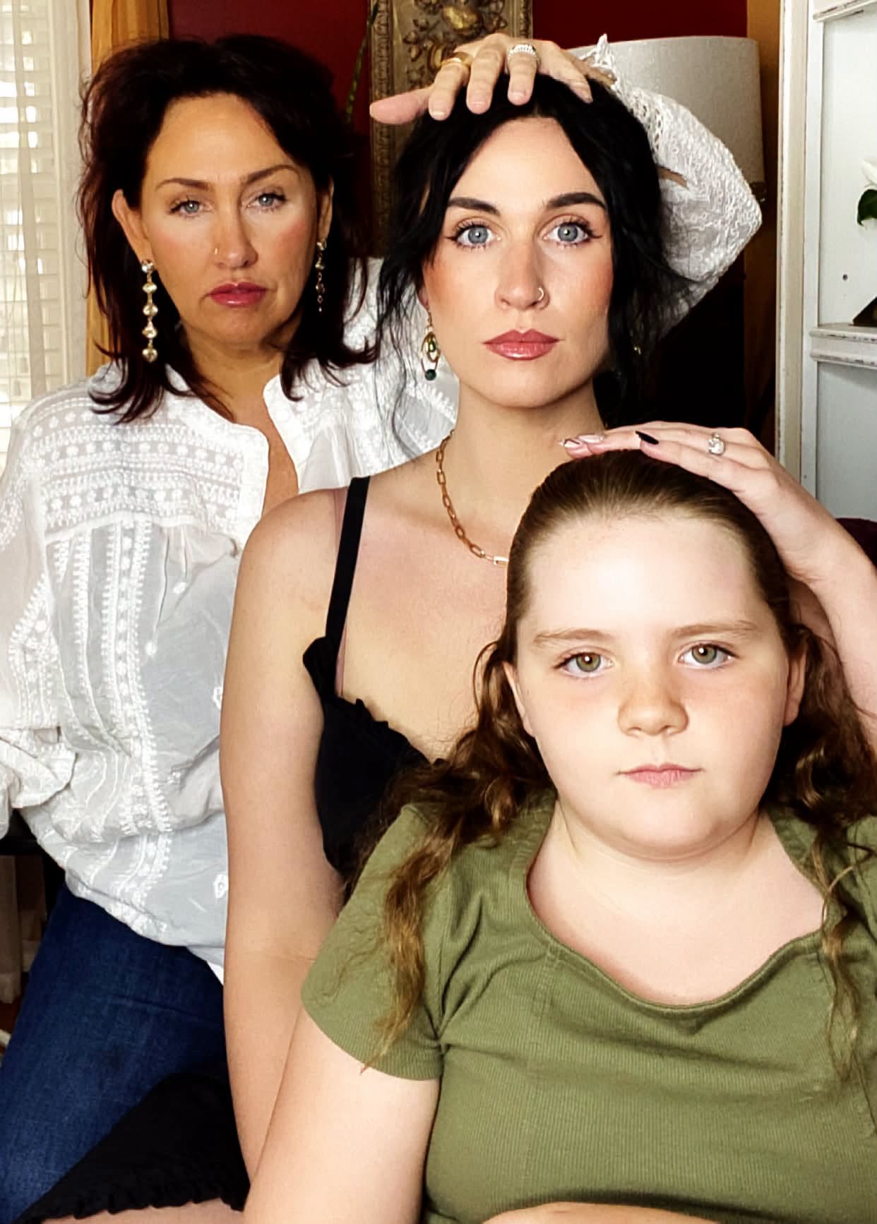 A symbolic image representing a mother fiercely protecting her daughter, illustrating family boundaries, breaking generational misogyny, women's empowerment, and choosing healing over toxic relationships.
