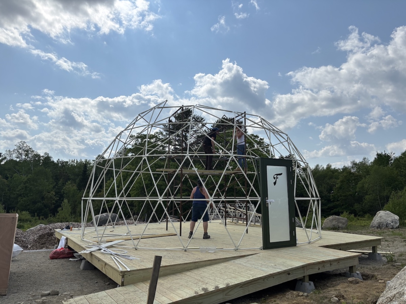 Bare dome frame on a wooden deck