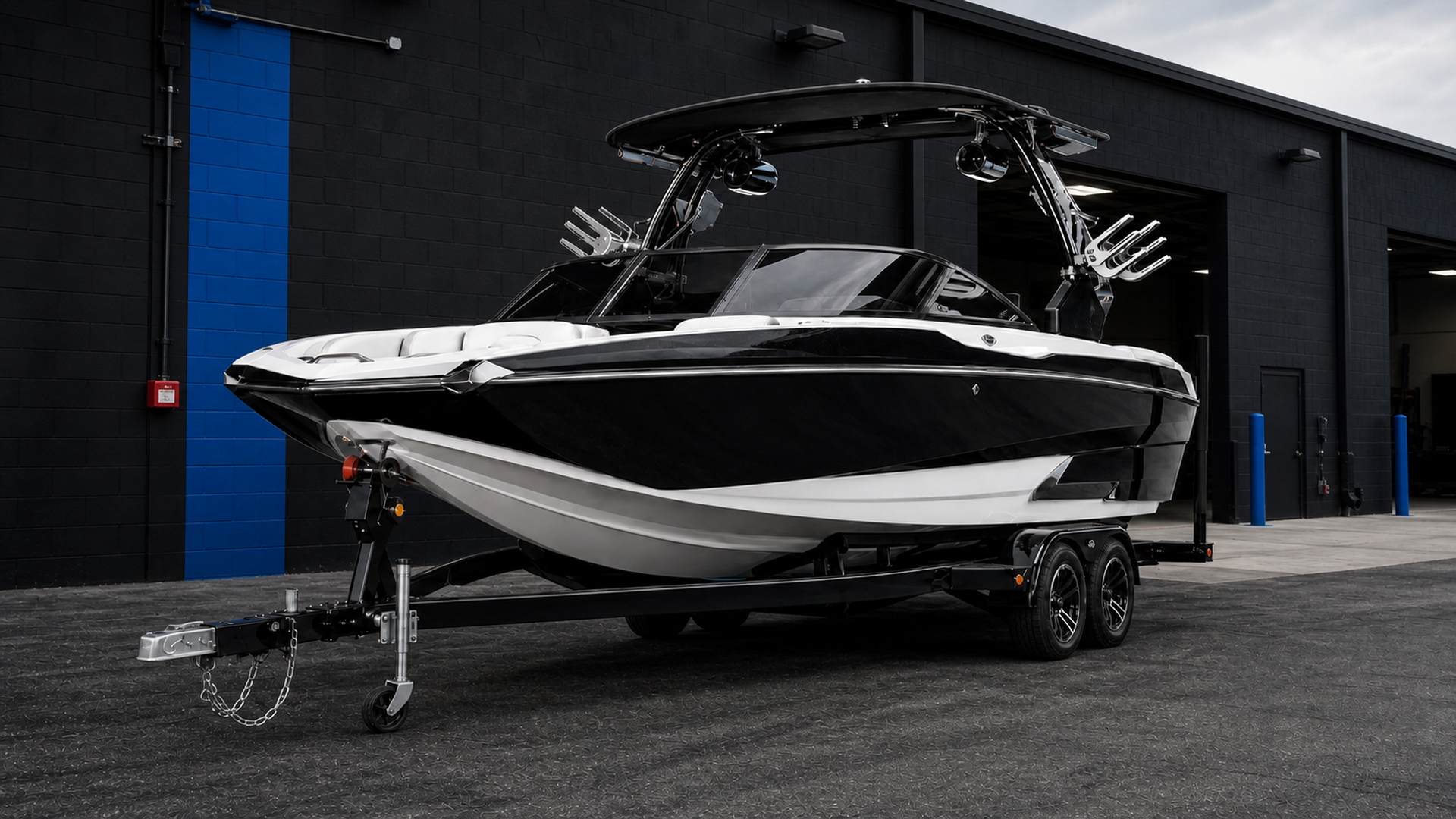 Premium black and white wake boat