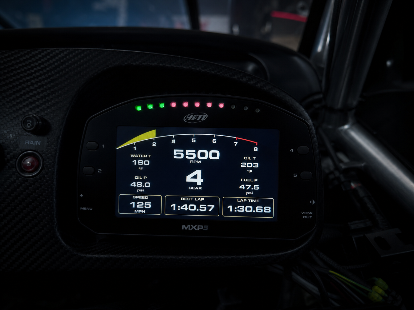 AiM digital dash in race car cockpit — data acquisition installs Houston TX