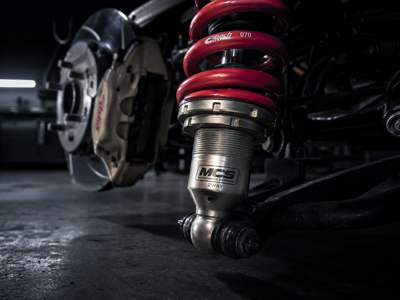 Coilover suspension unit on track car — suspension setup and corner weighting Houston TX