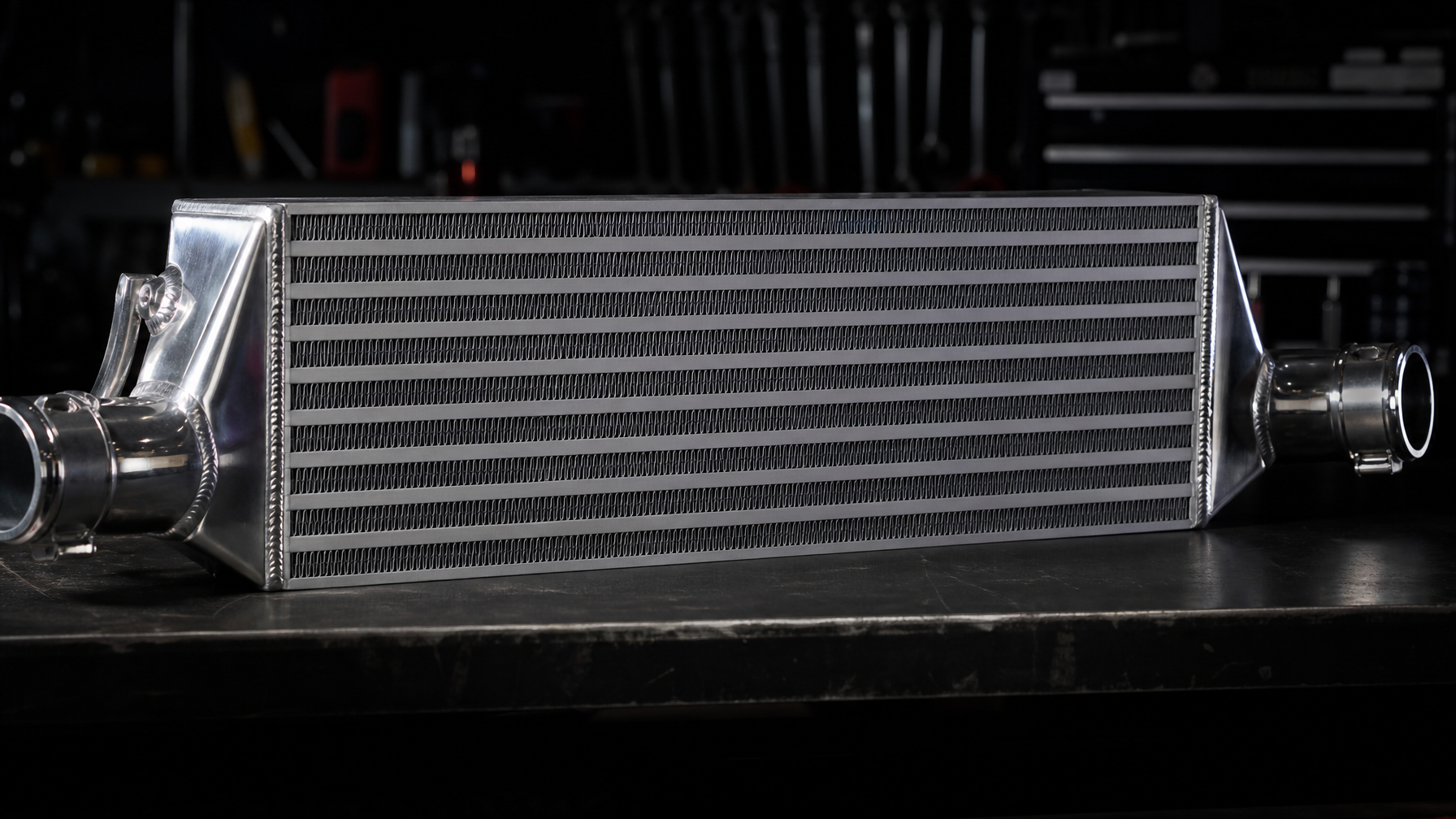 Aluminum front-mount intercooler with polished piping — cooling system upgrades Houston TX