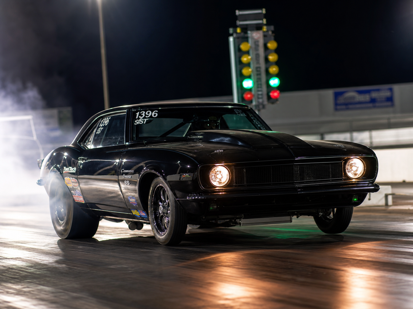 Drag car launching at night — drag racing builds Houston TX