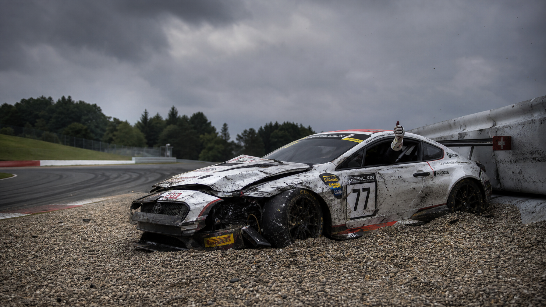 Race car crash thumbs up — driver safe inside roll cage at Iron Ridge Motorsports Houston