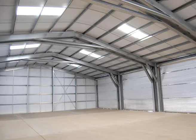Commercial metal building interior with open floor space.