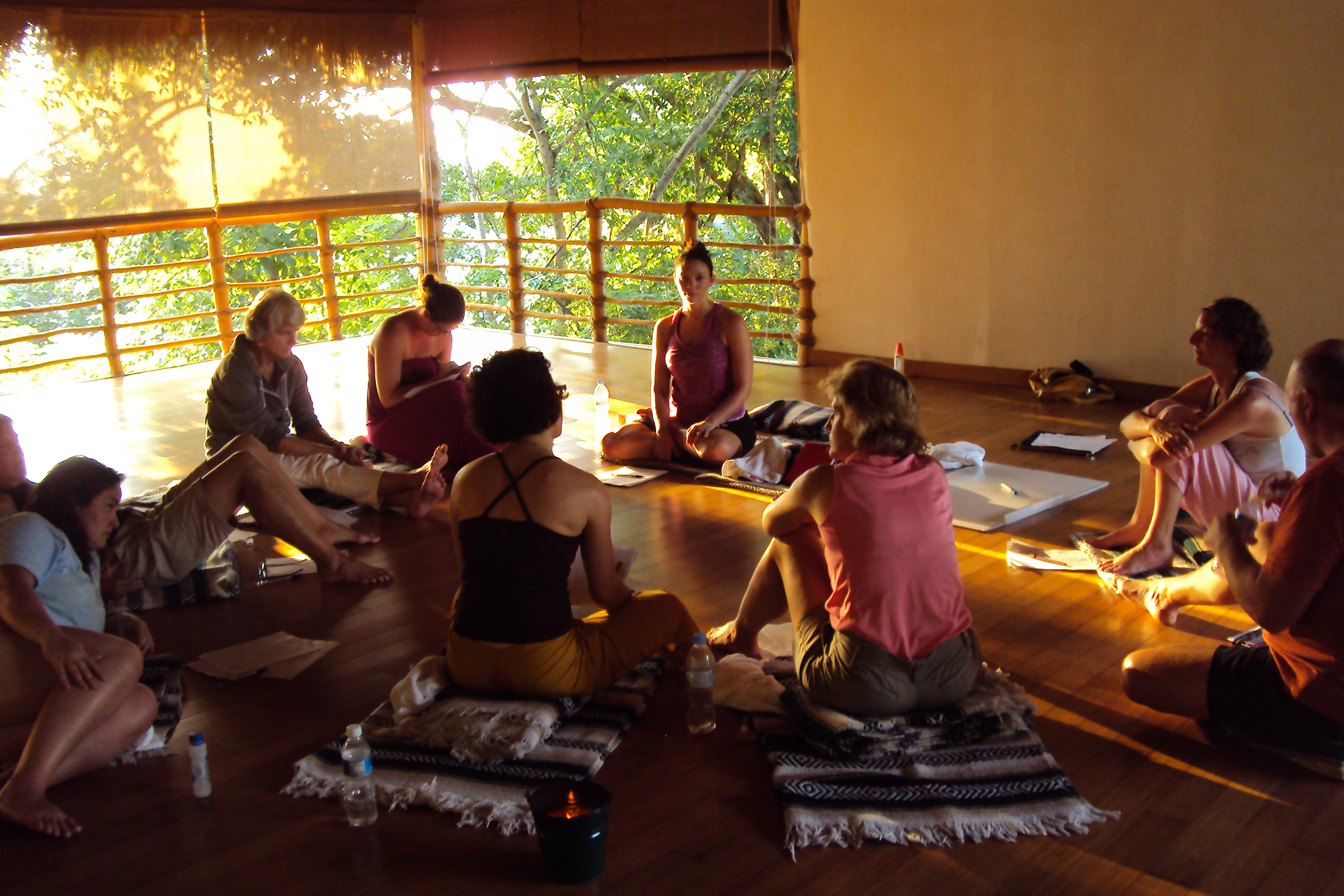 Krista leading an in-depth afternoon yoga workshop