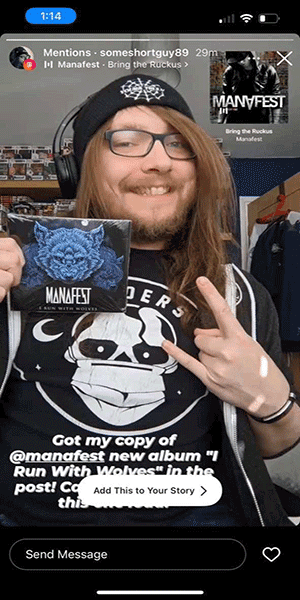 Fan holding the I Run With Wolves CD