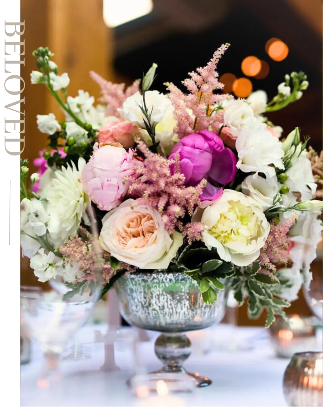 Romantic wedding table flowers with soft pink and white blooms created for a Montreal wedding reception