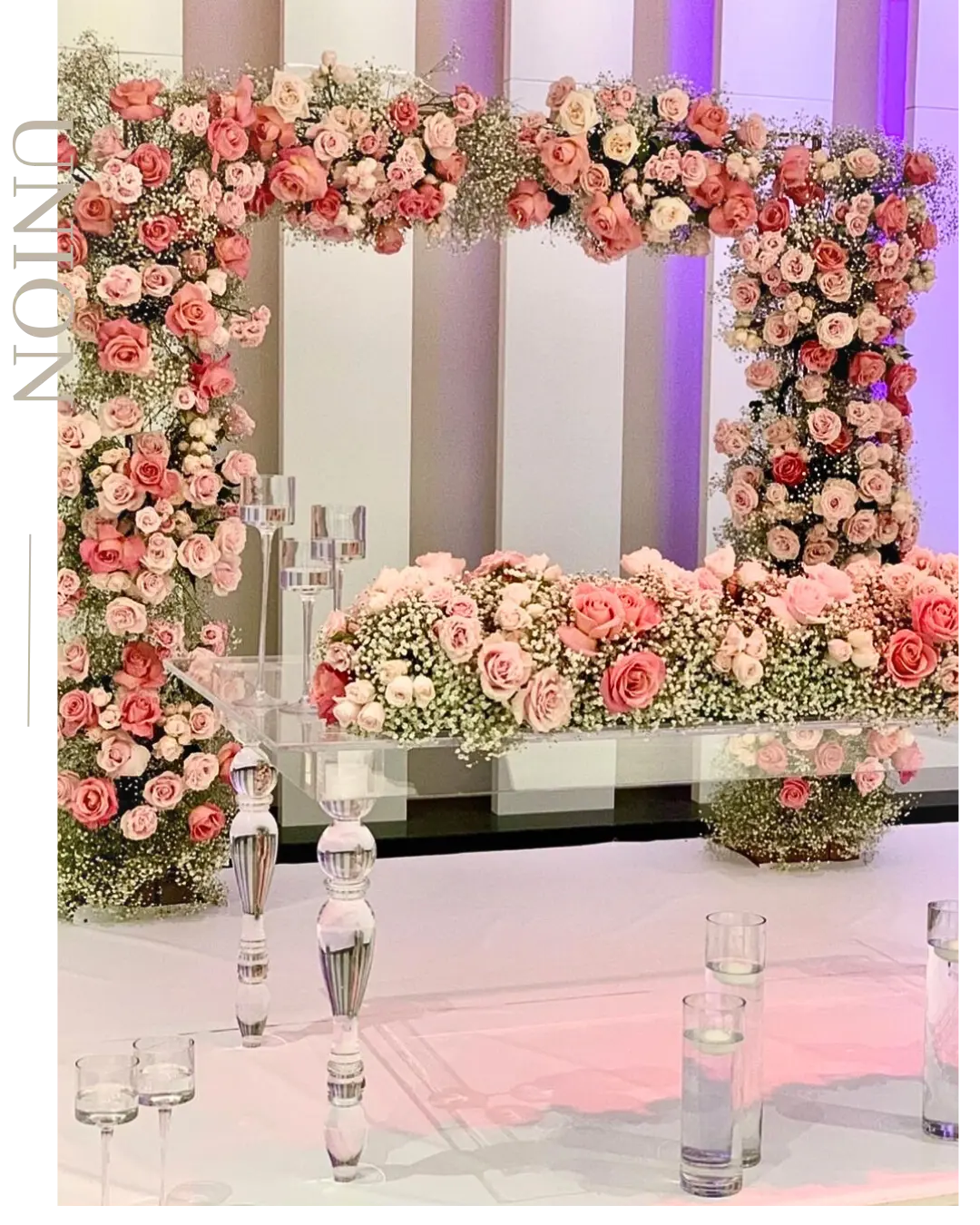 Luxury wedding head table flowers with cascading roses and hydrangeas designed for a Montreal wedding