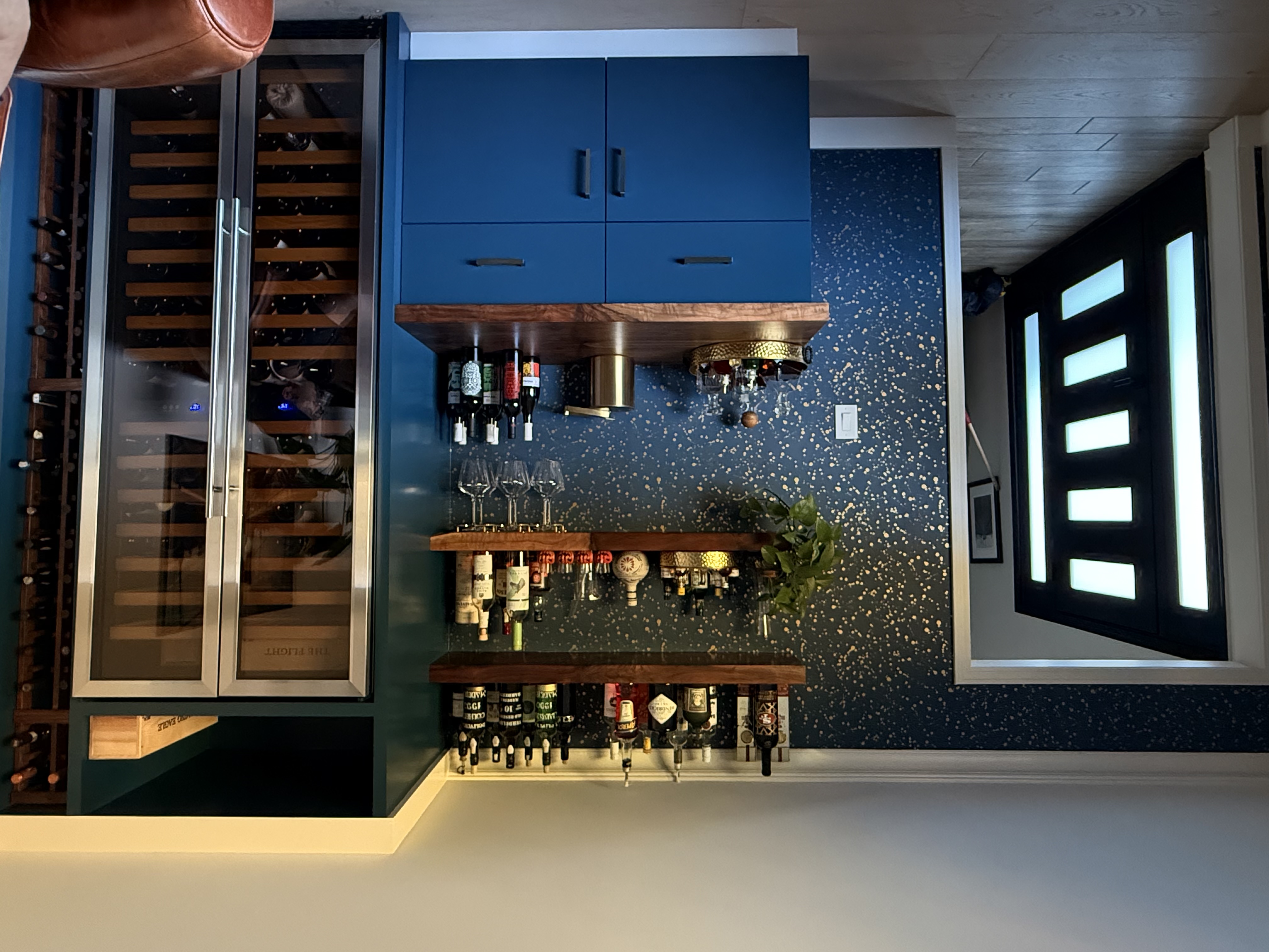 “Textured wallpaper installation in contemporary interior with seamless finish and bold feature wall.”