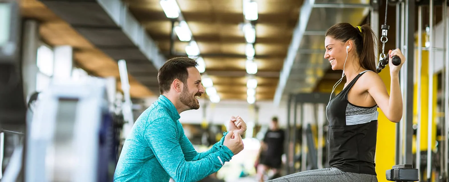 Person at a desk contemplating a career change to personal training Person at a desk contemplating a career change to personal training