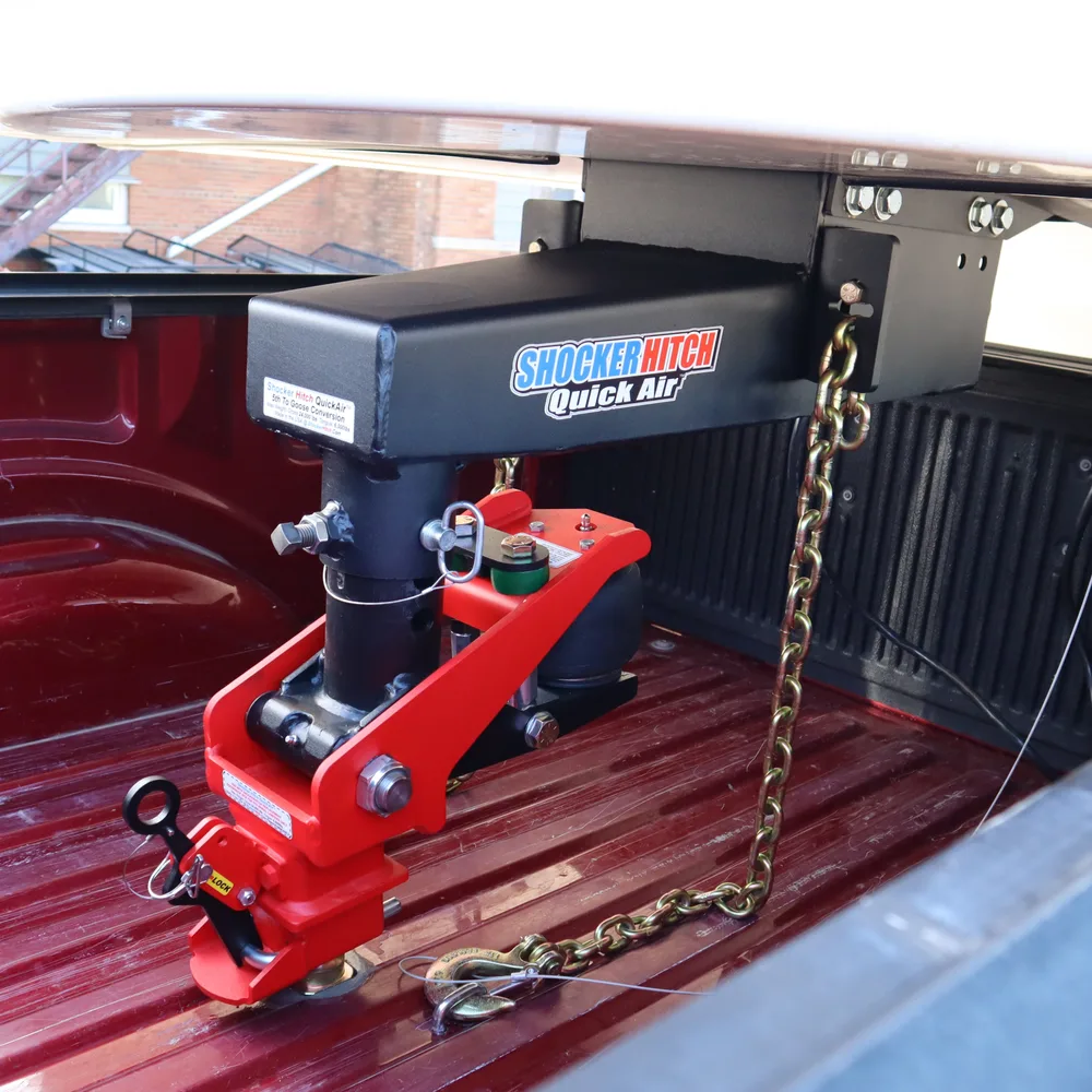 Shocker Quick Air 5th wheel to gooseneck kit for Lippert Turning Point installed and hooked up with safety chains