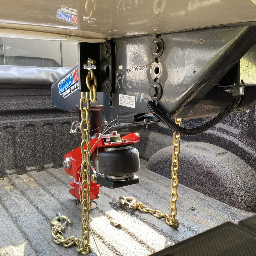 Rear view of the Shocker Quick Air 5th wheel to gooseneck kit hooked up