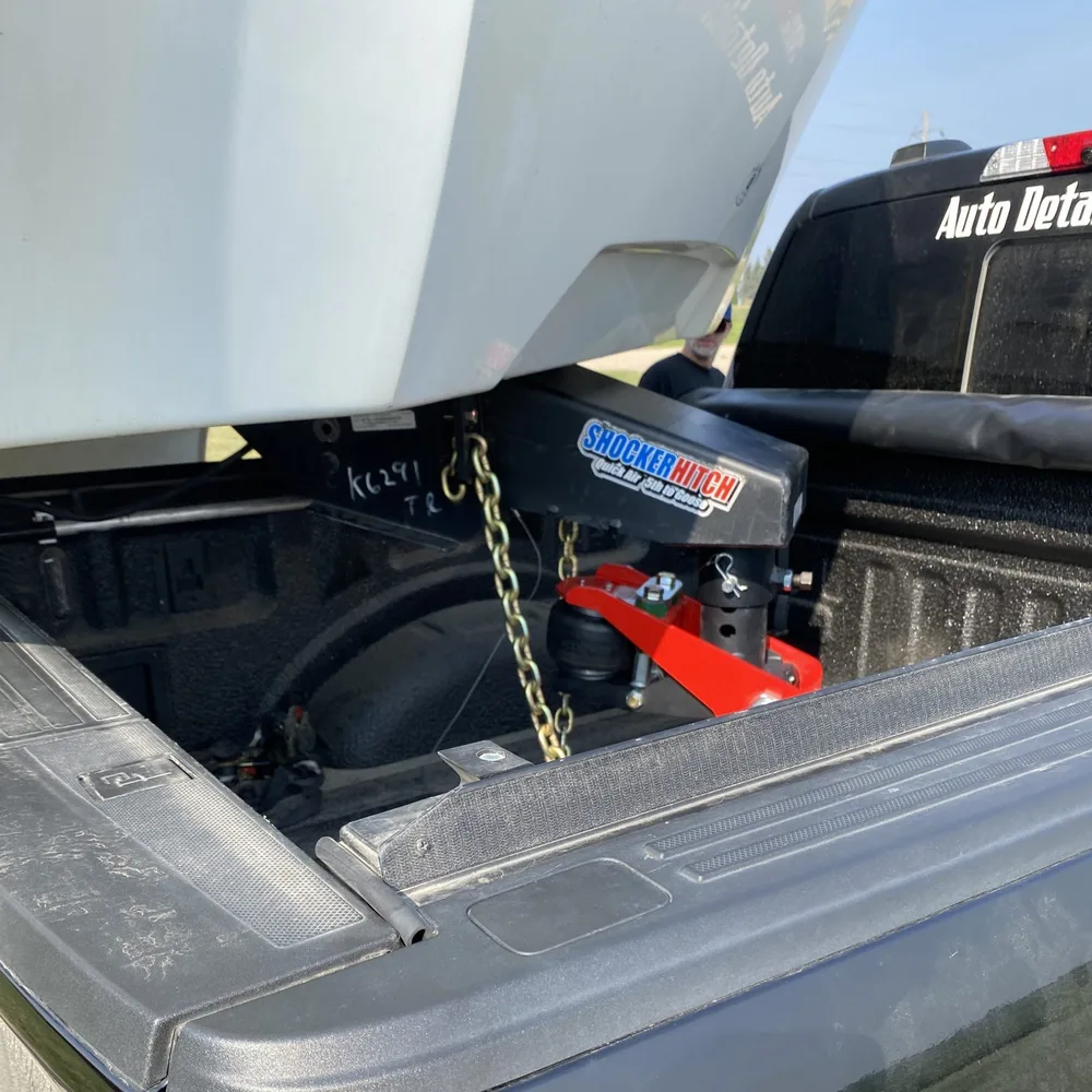 Shocker Quick Air 5th wheel to gooseneck kit showing cab and bed clearance on a Ford F-150 extra short bed