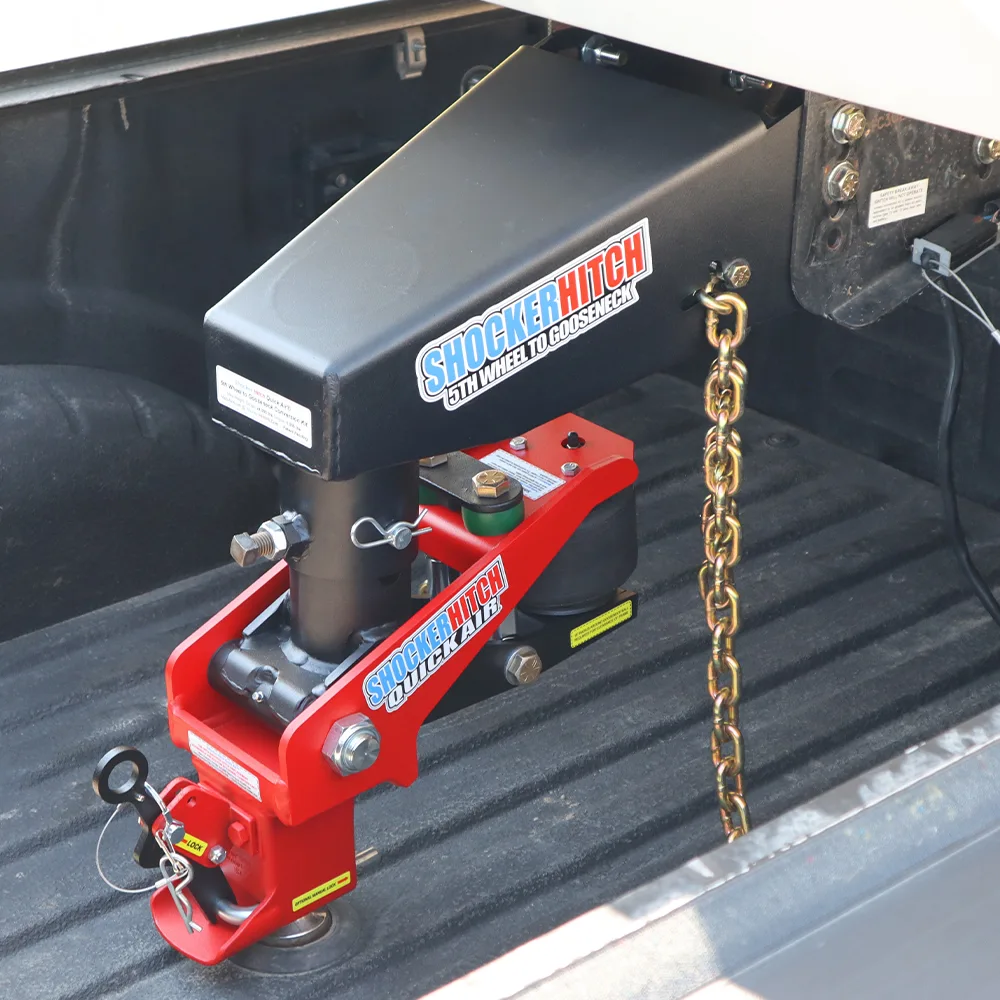 Shocker Quick Air 5th wheel to gooseneck Shift Lock coupler with chain kit hooked up to the gooseneck ball