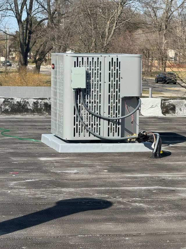 A1 Precision HVAC technician performing service work