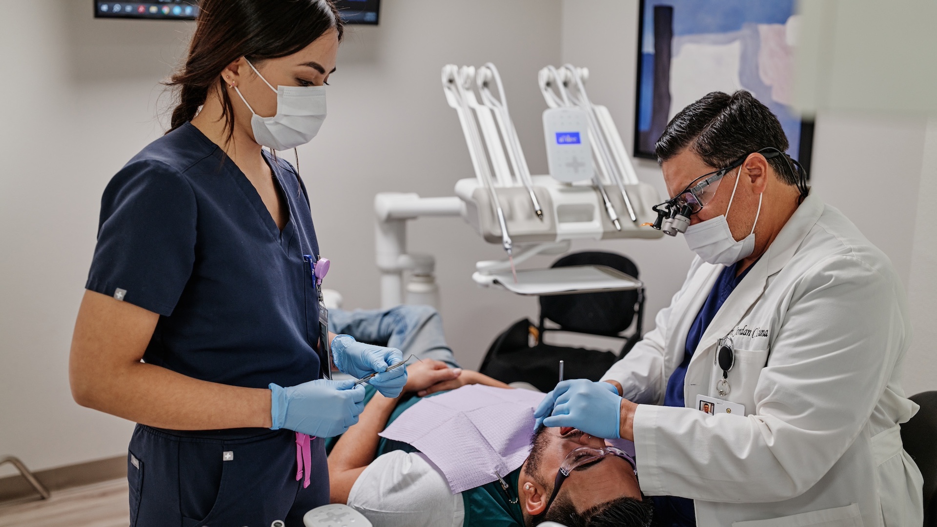 The Integrity Dental Boston team restoring a tooth in the treatment room