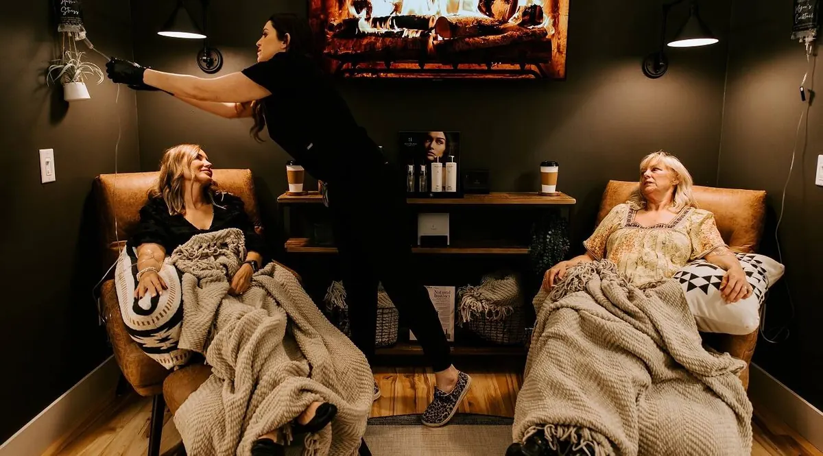 Patients relaxing in the clinic's treatment lounge