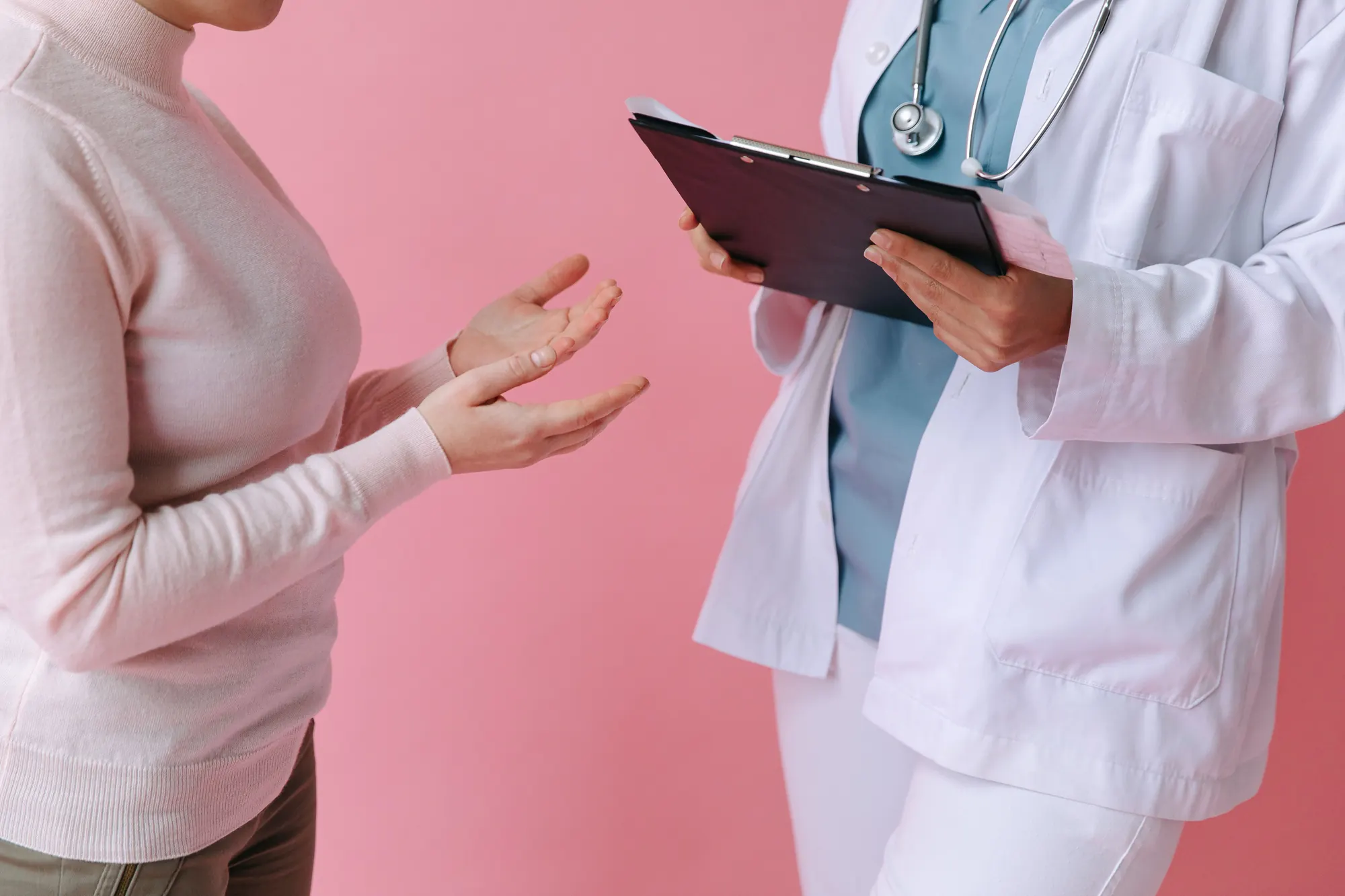 A patient talking through her plan at a consultation