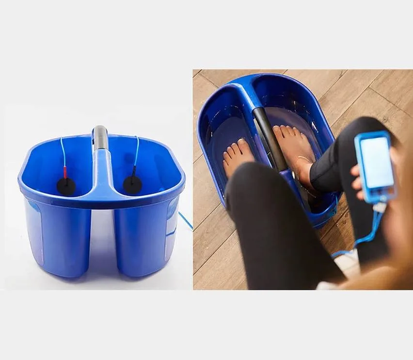 Nerve Reviver foot bath with electrodes, and a patient using it at home