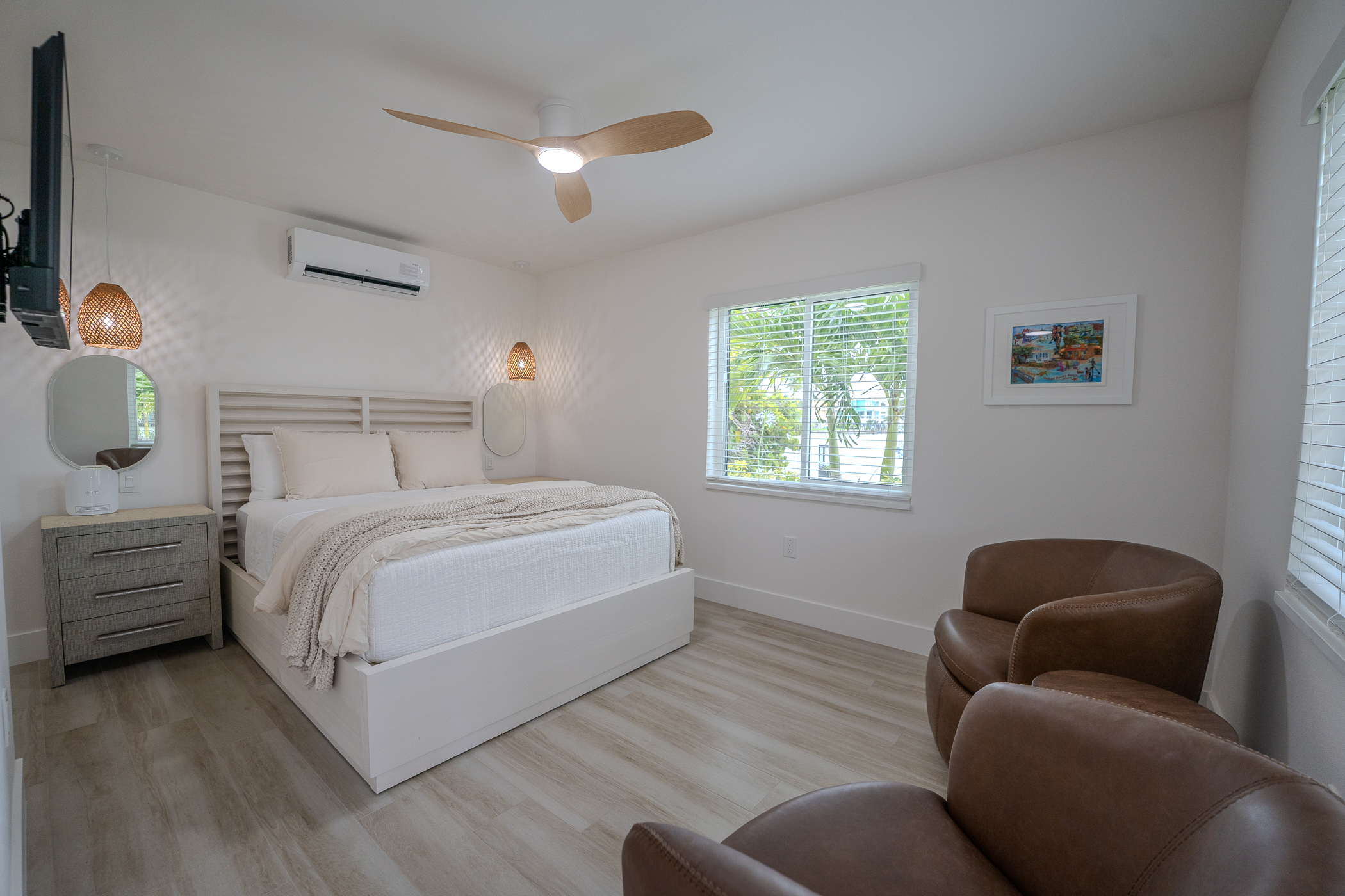 Finished bedroom renovation with custom details and flooring in Pinellas County FL