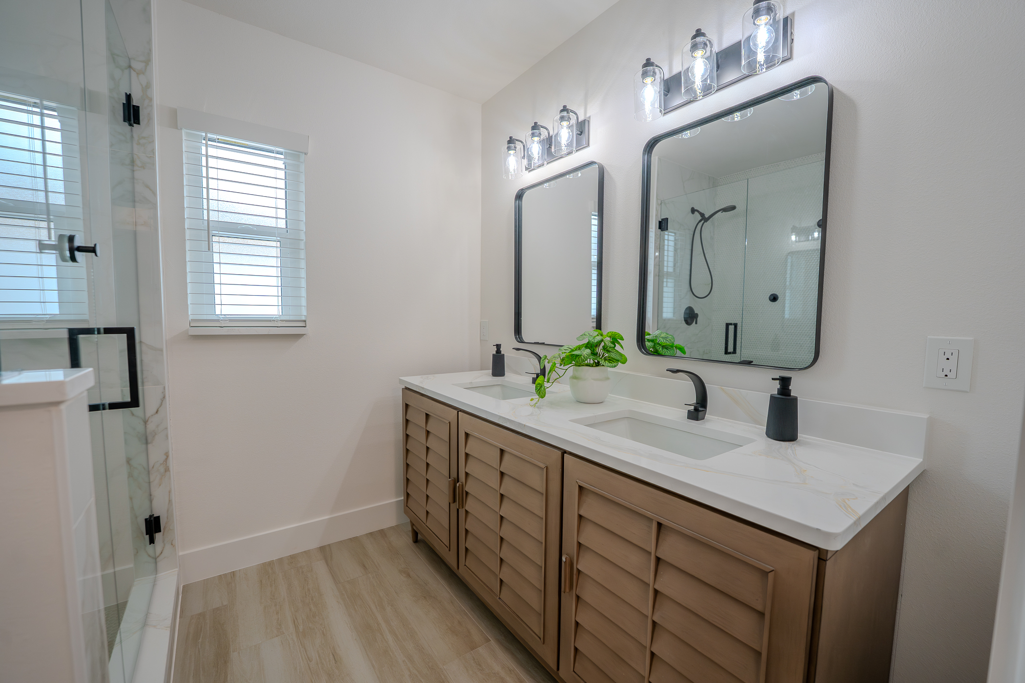 Large format marble tile flooring in a walk-in shower renovation in Largo FL