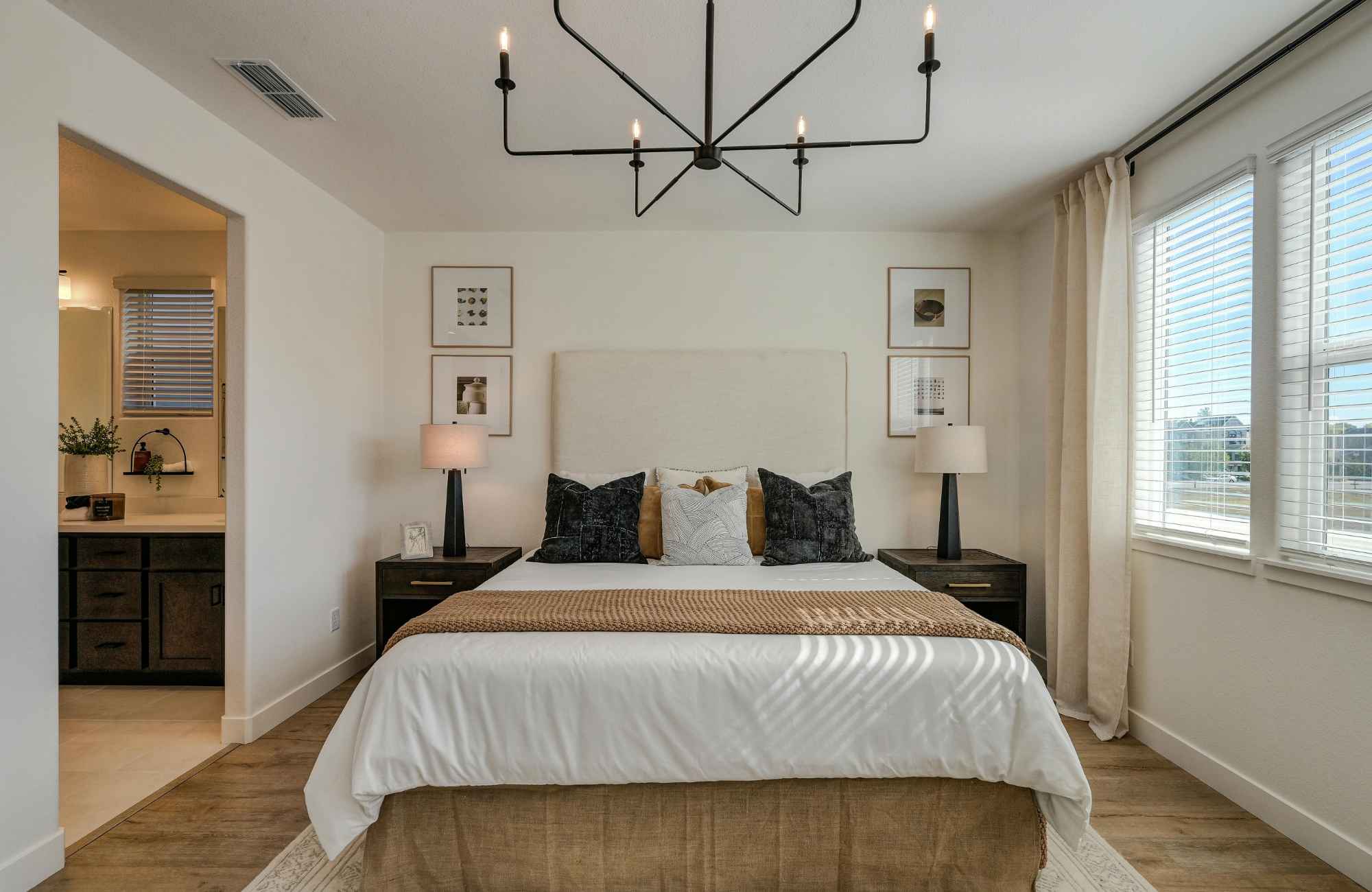 professional-home-organizing-cherry-creek-co-ready-for-professional-organizer-bedroom-with-minimalist-light-fixture-view-into-bathroom-comfortable