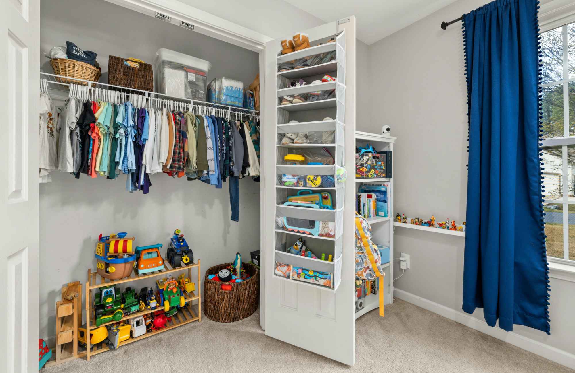 organized-by-keli-&-co-cherry-creek-co-daily-organization-habits-boys-bedroom-clothes-hung-neatly-in-closet-over-the-door-organizer-toys-in-bins-curated