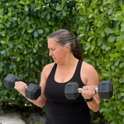 Christine training with dumbbells