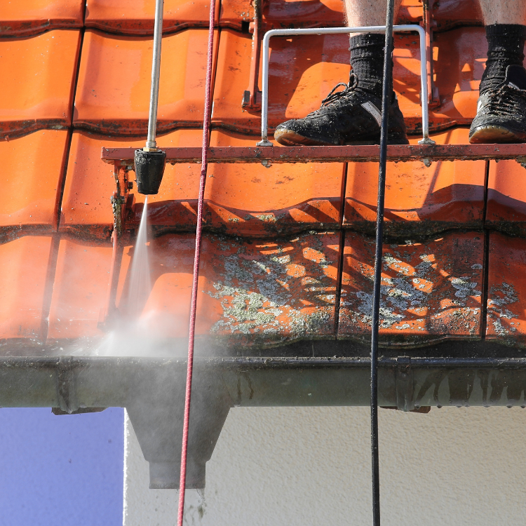 Roof being cleaned