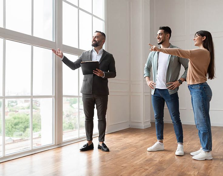 man inspecting empty townhouse man inspecting empty townhouse