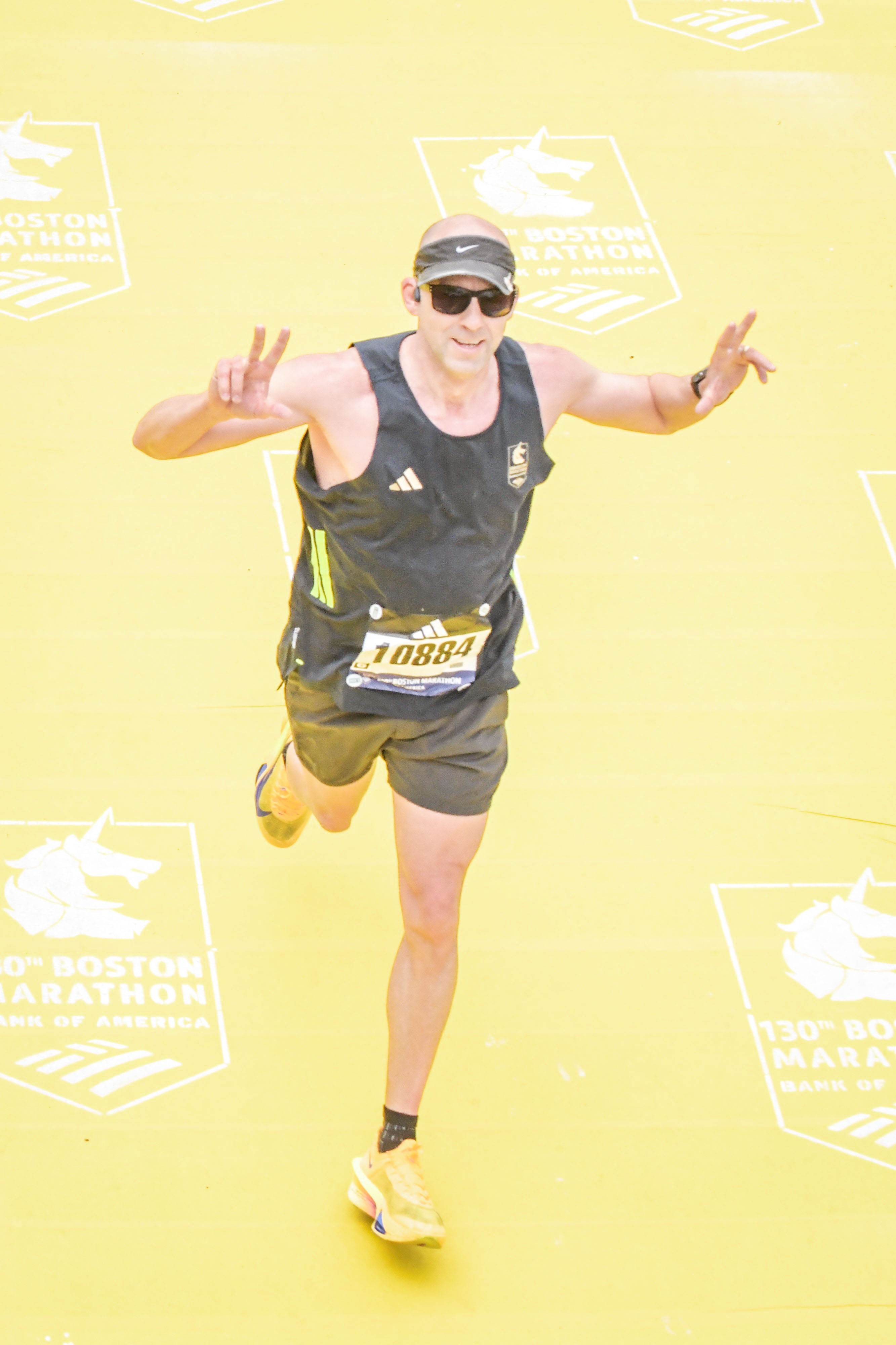 Coach Joe Beckerley finishing the Boston Marathon