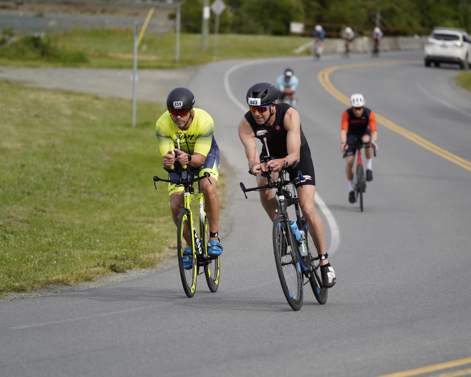 Triathletes training on the bike