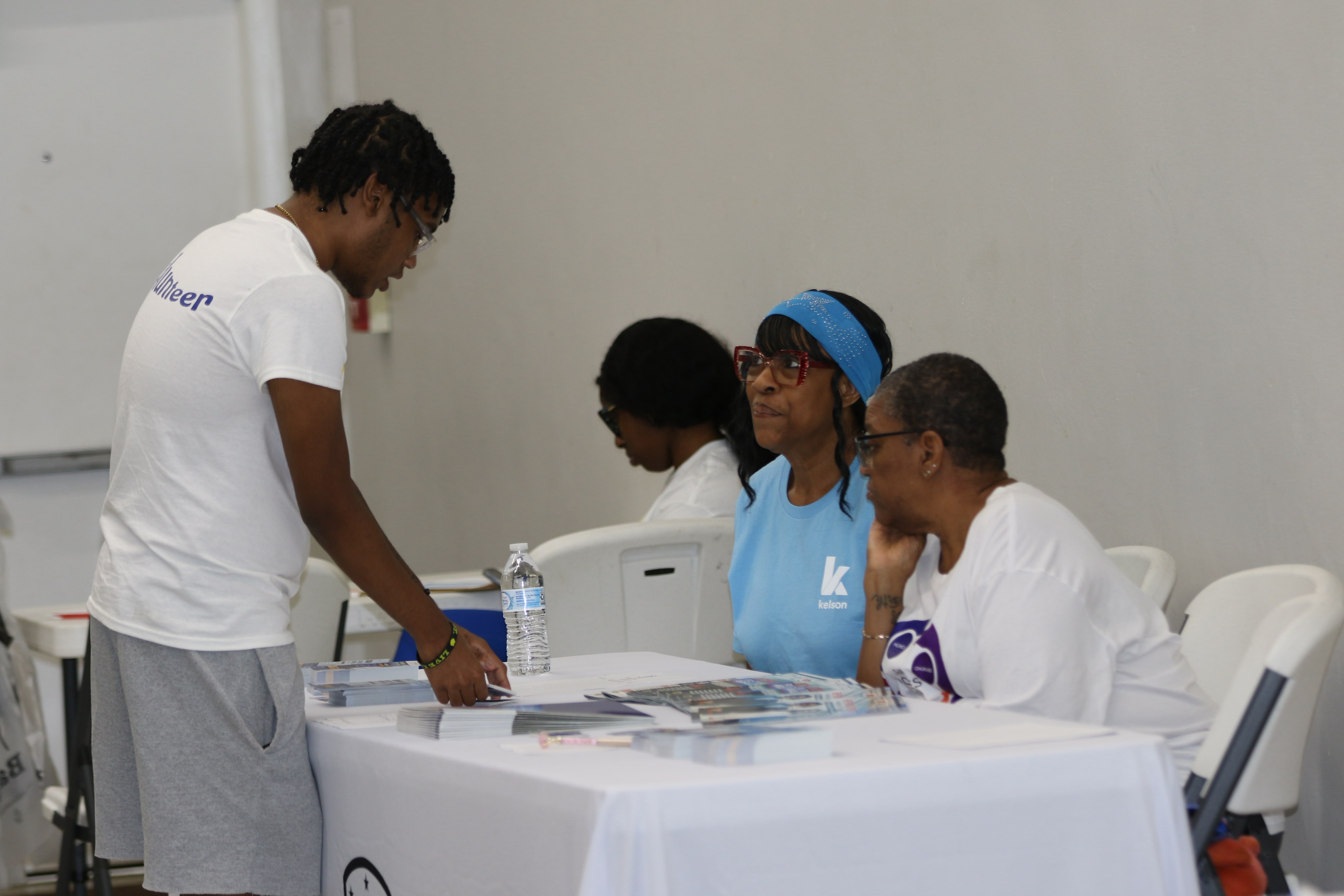 WelCare volunteers preparing resources for community distribution