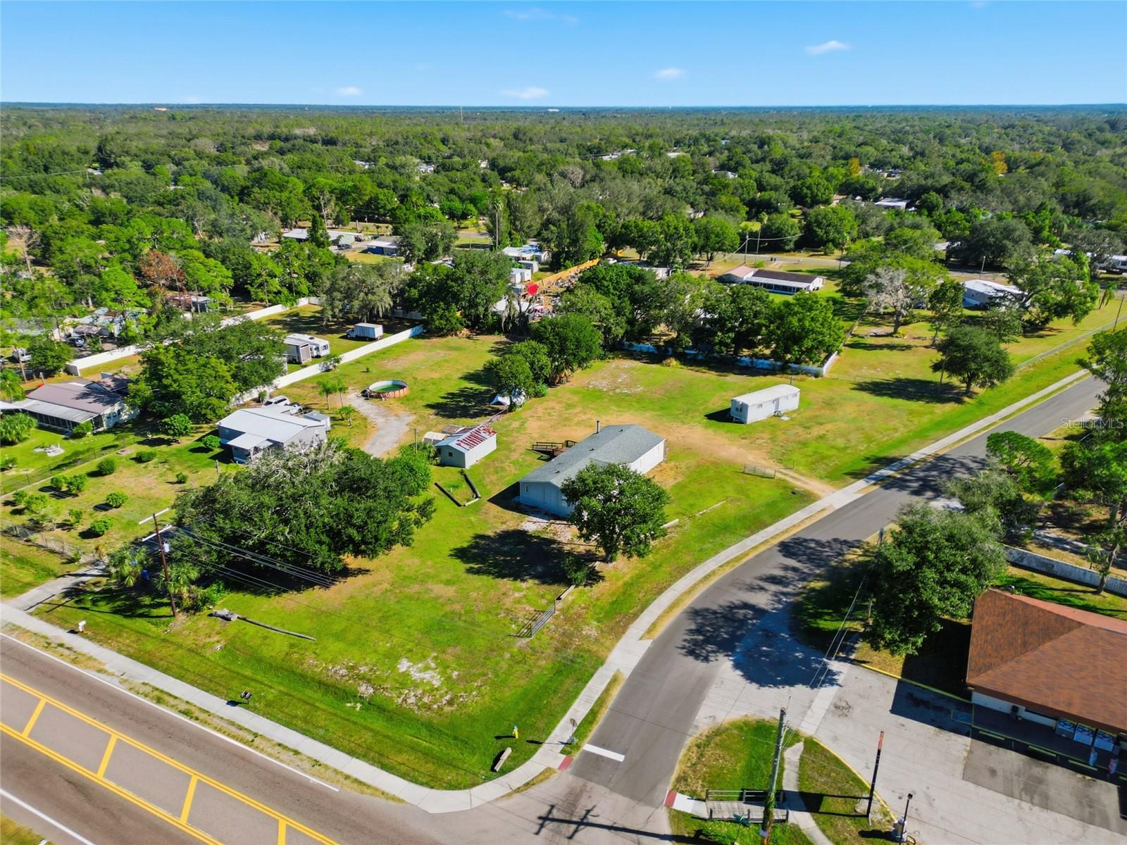 Additional aerial property view at 12422 Balm Riverview Road. Aerial markers do not establish surveyed boundaries.