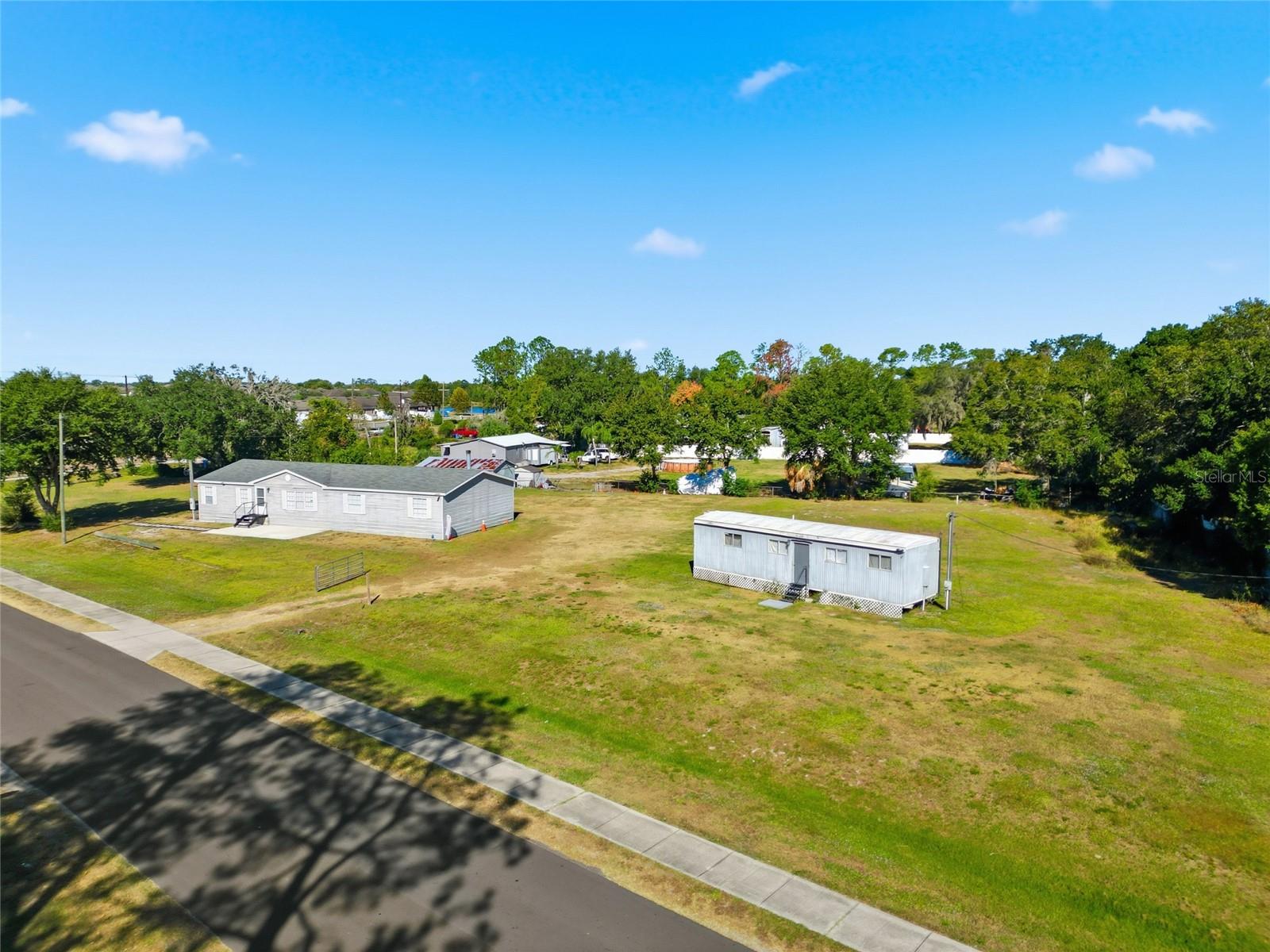 Exterior and land setting at 12422 Balm Riverview Road. Aerial markers do not establish surveyed boundaries.