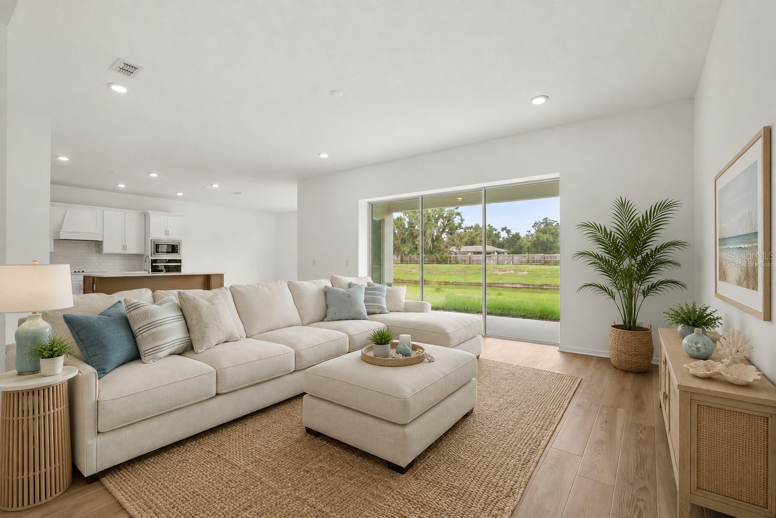 Living area at 12105 Orchid Ash Street. Virtually staged.