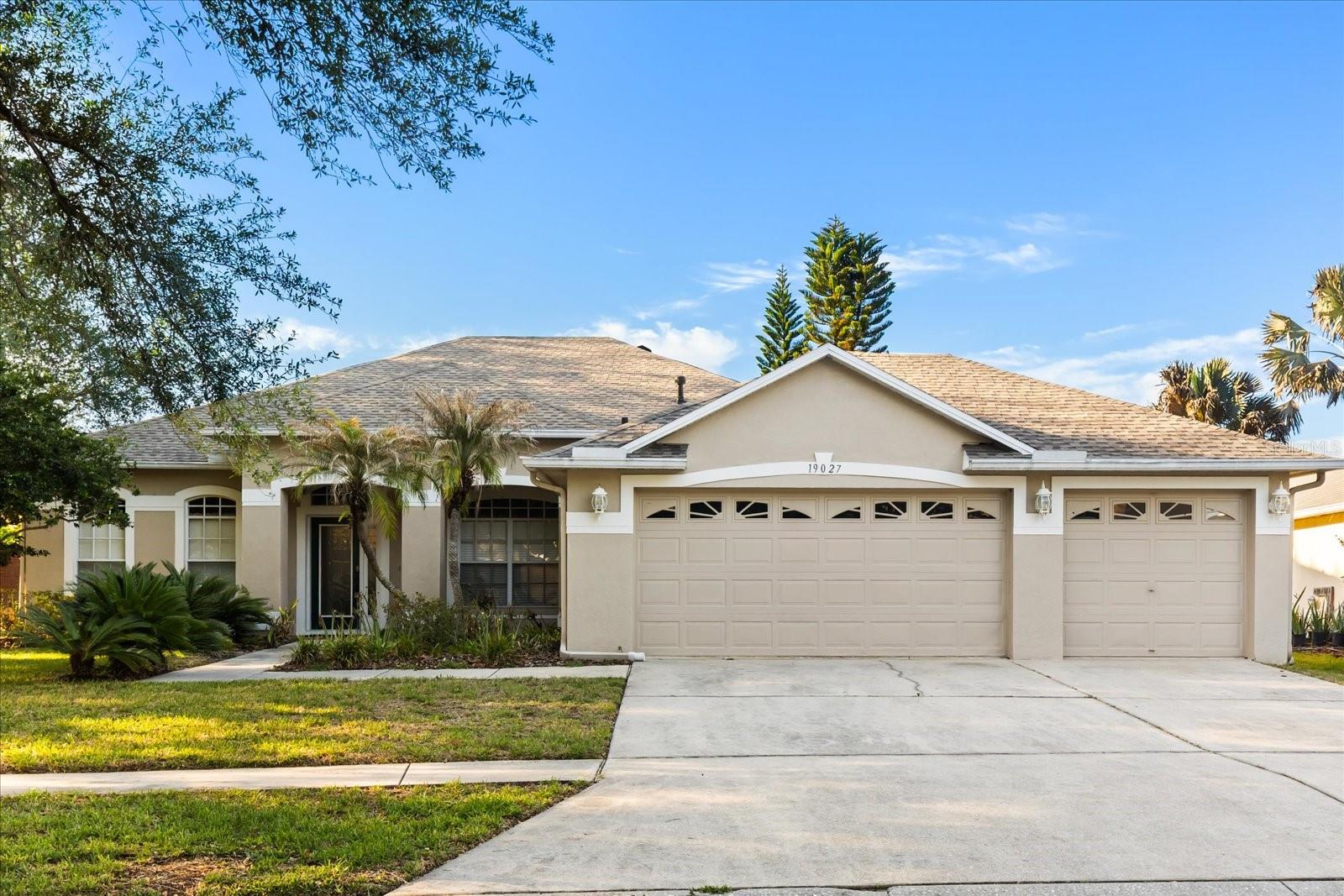 Front exterior at 19027 Dove Creek Drive.