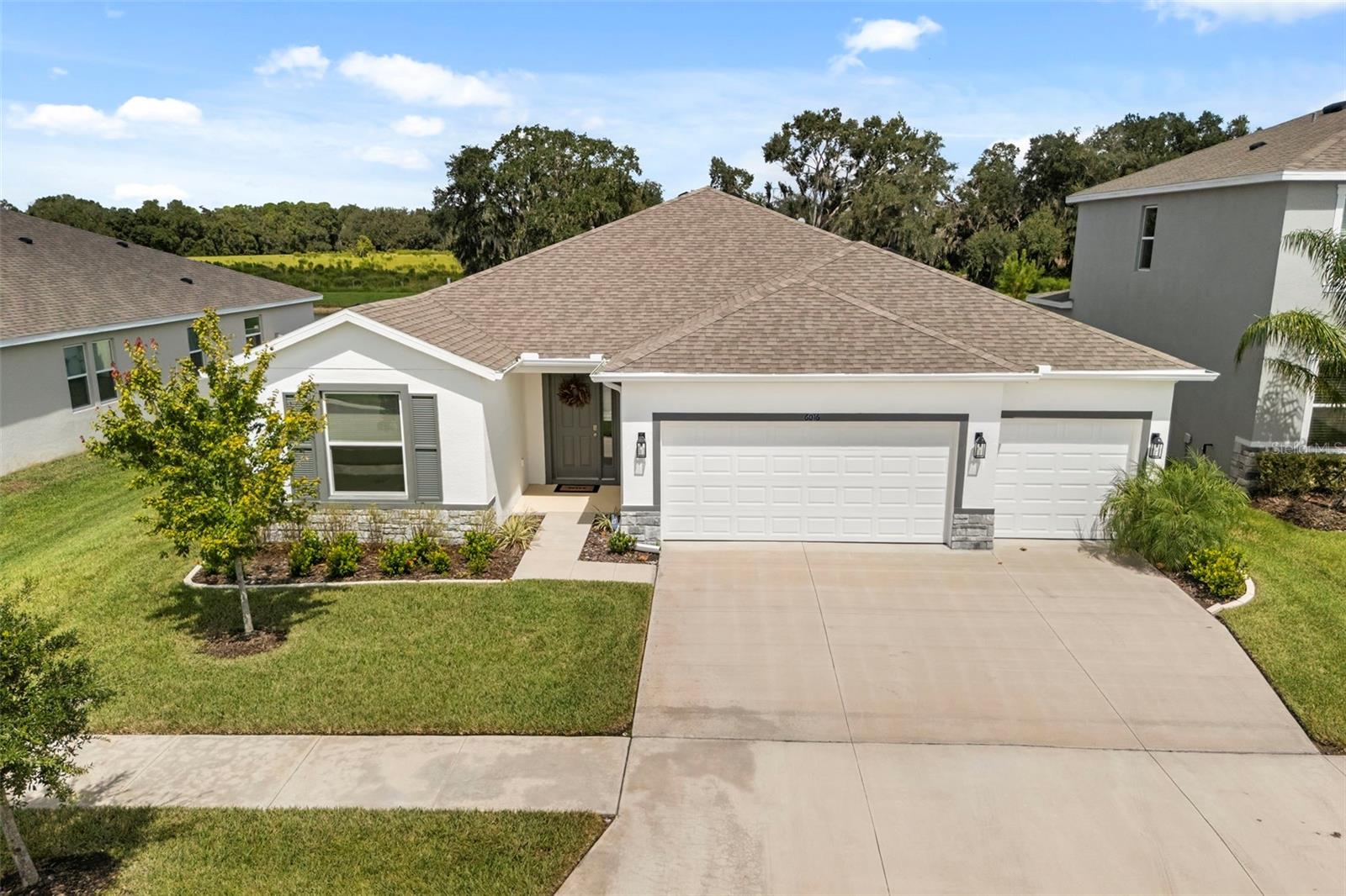 Front exterior at 6016 Wandering Willow Drive.