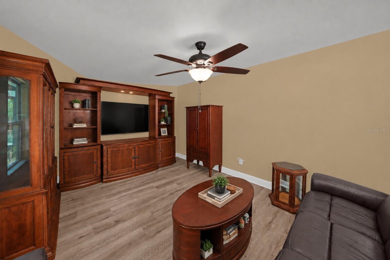 Living area at 22002 Darley Place. The listing includes virtually staged photography.