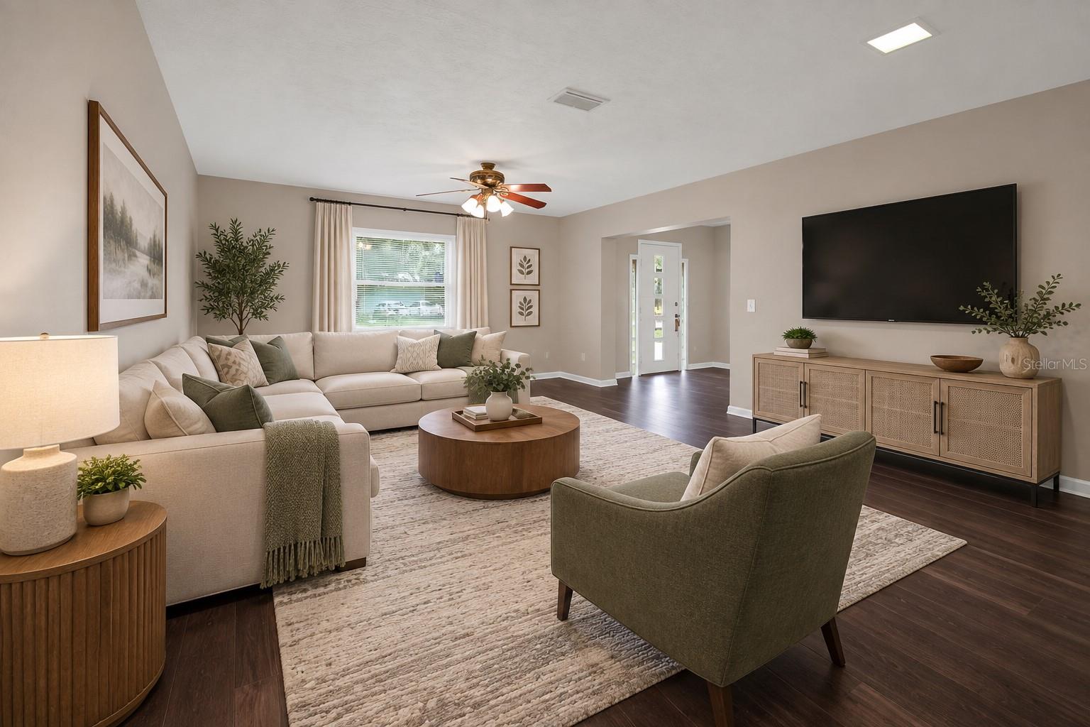Living area at 116 Windy Circle. The listing includes virtually staged photography. Living area at 116 Windy Circle. The listing includes virtually staged photography.
