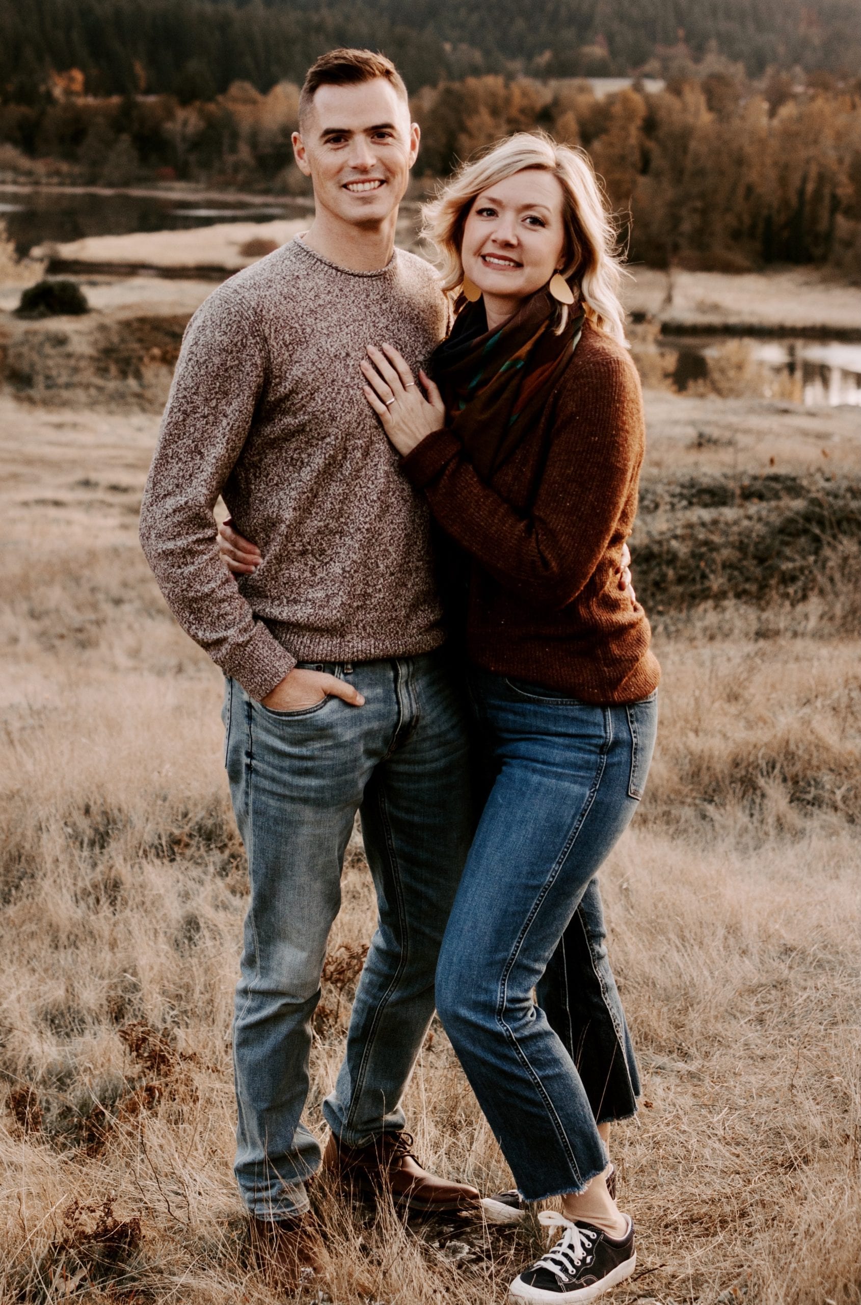 Portrait of the two FieldBridge Collective founders standing in a community workshop.
