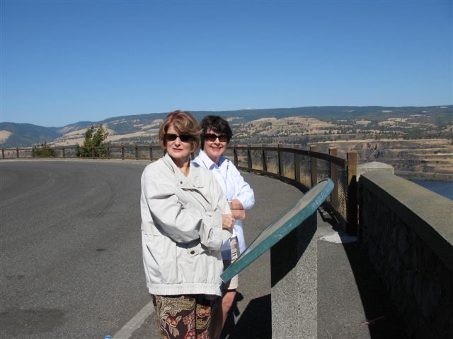 Two Seniors Looking At A Tablet