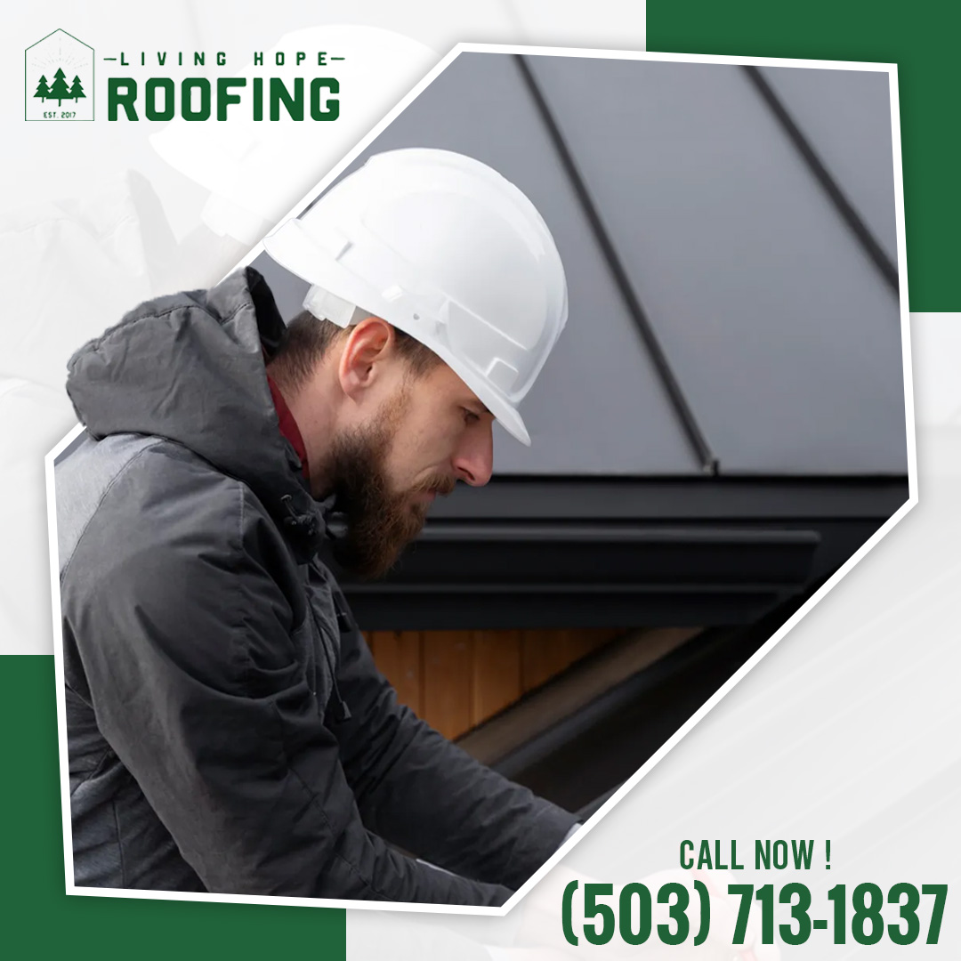 Professional roofing contractor wearing a white hardhat and jacket inspecting a dark metal rooftop. Professional roofing contractor wearing a white hardhat and jacket inspecting a dark metal rooftop.