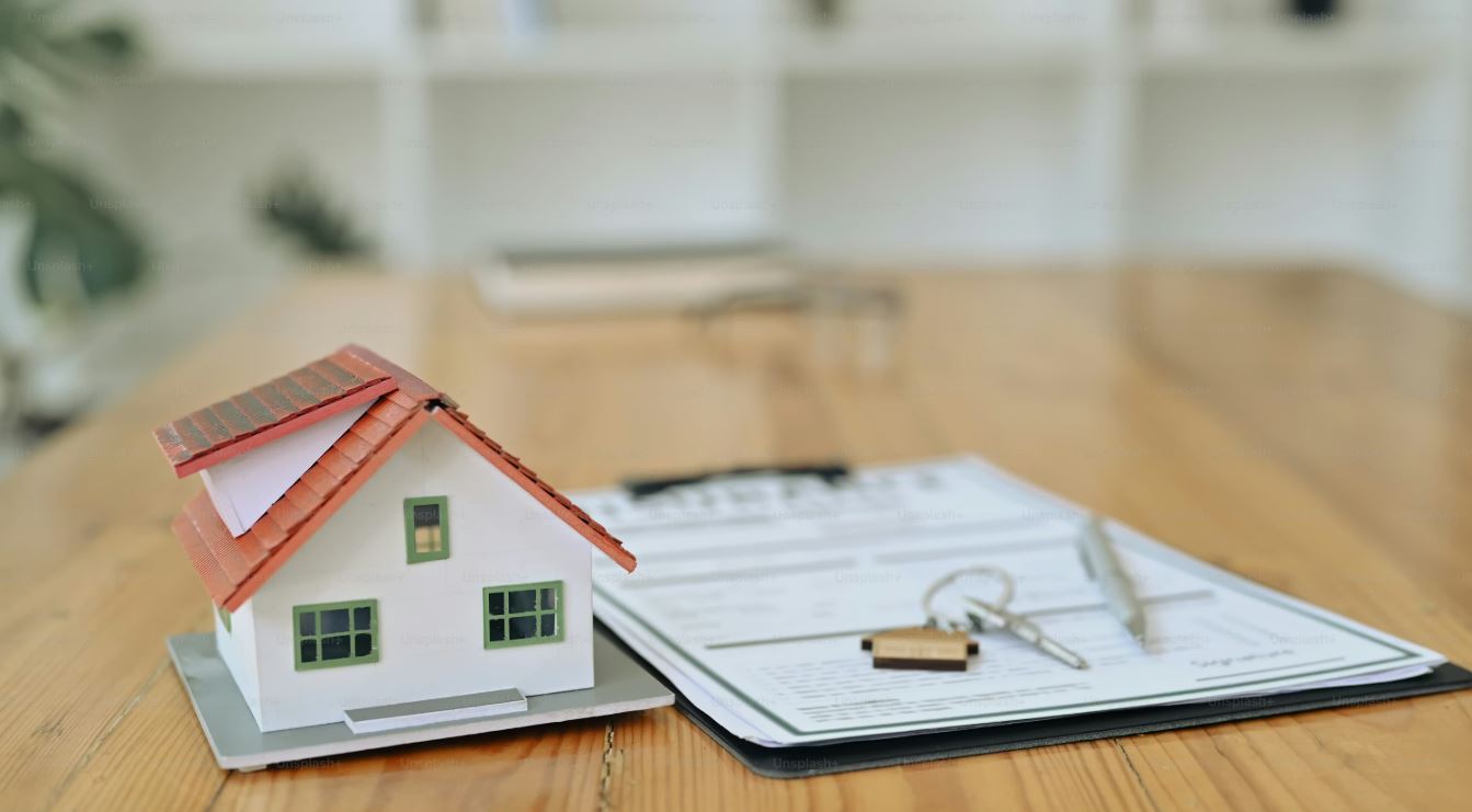 Home and paperwork representing probate and mortgage decisions in North Jersey