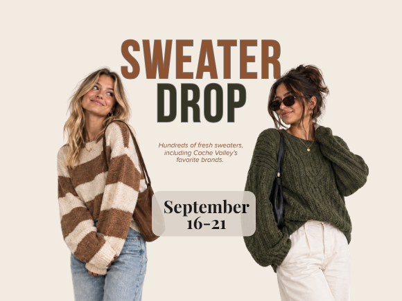 Two women modeling cozy fall sweaters at Uptown Cheapskate Logan during the September 16–21 Sweater Drop, featuring relaxed Gen Z styling in earthy green, cream and brown tones.