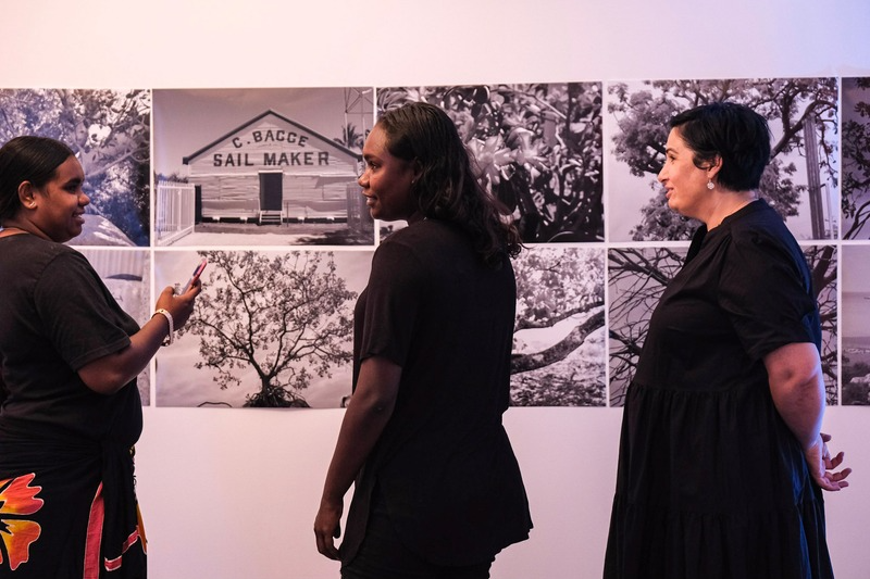 People talking at exhibition