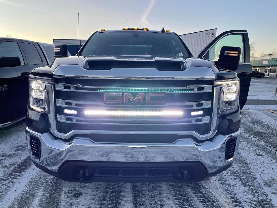 GMC truck with Rigid, GoRECON, and Putco LED lights for versatile lighting solutions in any condition.